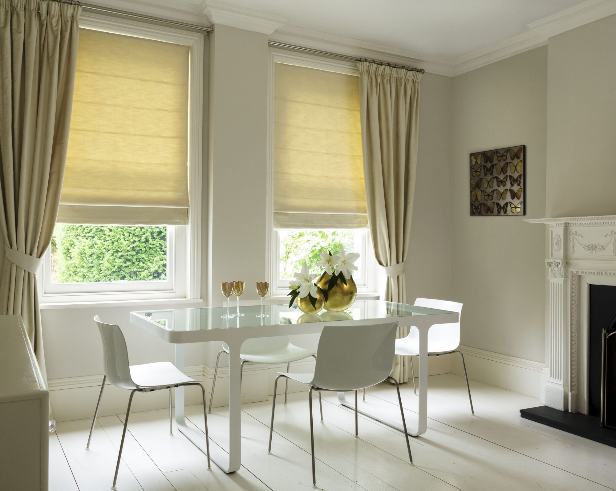 Pleated blinds in a cream dining room