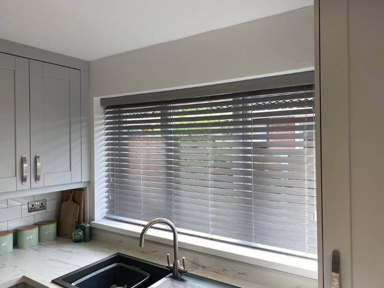 grey venetian blind in kitchen