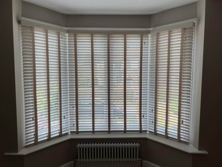 light wooden venetian blinds in living room