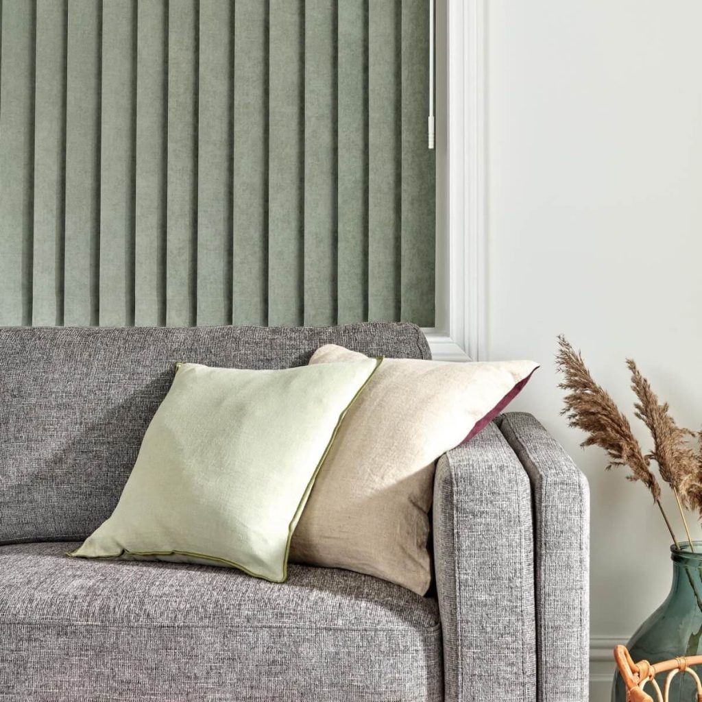 vertical blinds with a sofa